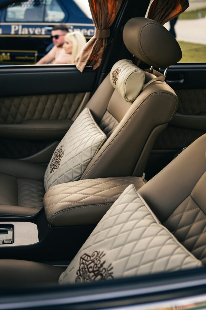 Interior of a well-maintained used car showing the dashboard, steering wheel, and front seats.